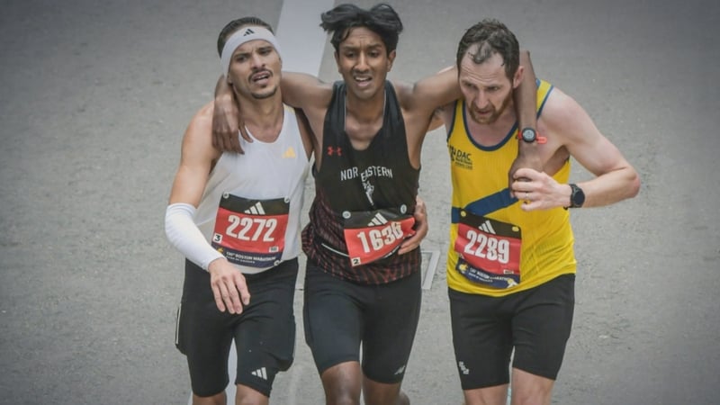 'Natural instinct': Down runner helps man finish marathon