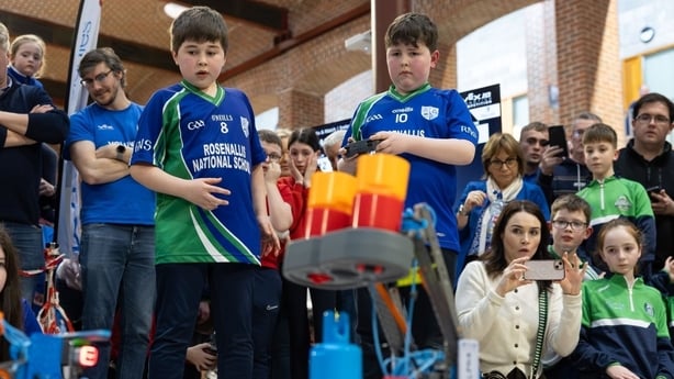 Kids demonstrate the robots in action