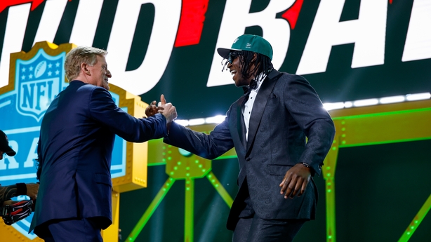 David Bailey of Texas Tech embraces NFL Commissioner Roger Goodell after being selected second overall by the New York Jets during Round One of the 2026 NFL Draft at Acrisure Stadium on April 23, 2026 in Pittsburgh, Pennsylvania.