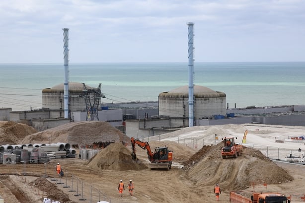 This photograph taken on March 12, 2026, shows the EPR2 construction site (foreground) at the Penly nuclear power plant (seen rear) in Petit-Caux on the English channel coast. The nuclear recovery program announced in 2022 by France's President Emmanuel Macron provides for the construction of 6 new 