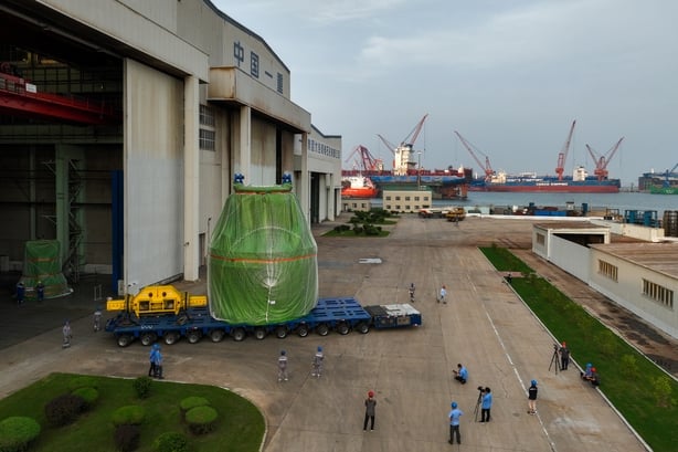 The Linglong One, Chinese produced modular reactor is transferred to a ship on July 14, 2023 in Dalian, Liaoning Province of China. 