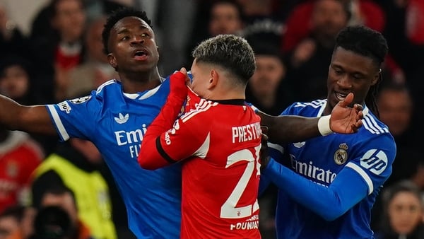 LISBON, PORTUGAL - FEBRUARY 17: Gianluca Prestianni of SL Benfica confronts with alleged racist comments directed at Goal Scorer Vinicius Junior of Real Madrid C.F. after goal celebrations during the UEFA Champions League 2025/26 League Knockout Play-off