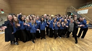 Marty meets the young men and women of Cór Linn  show image