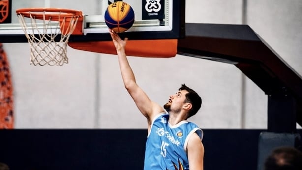 Adam Mullally scoring a point for La Celeste in 3x3 basketball.