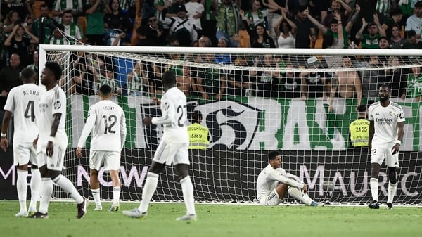 Real Madrid players react at the full-time whistle after the 1-1 draw with Real Betis