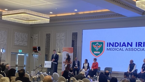 Minister Jack Chambers addressing the Indian Irish Medical Association conference