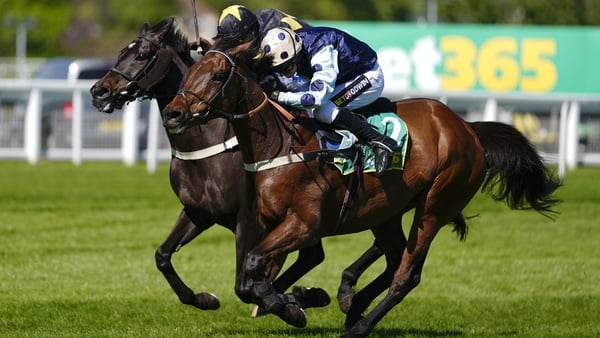 ESHER, ENGLAND - APRIL 25: Tom Cannon riding Edwardstone (spotted cap) clear the last to win The bet365 Celebration Chase at Sandown Park Racecourse on April 25, 2026 in Esher, England. (Photo by Alan Crowhurst/Getty Images)
