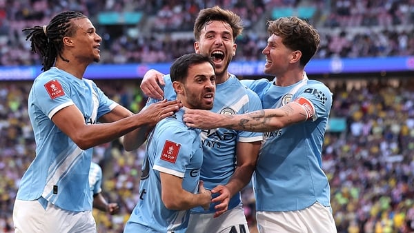 Nico Gonzalez of Manchester City celebrates scoring his team's second goal with teammates Nathan Ake, Bernardo Silva and John Stones during the Emirates FA Cup Semi Final match between Manchester City and Southampton at Wembley Stadium on April 25, 2026
