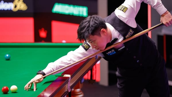 Zhao Xintong of China plays a shot in the second round match against Ding Junhui of China on day 8 of Halo World Championship 2026 at Crucible Theatre on April 25, 2026 in Sheffield, England.