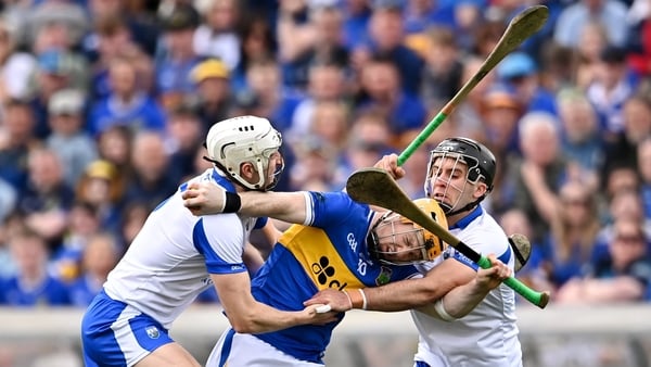Jake Morris of Tipperary is tackled by Jack Fagan, left, and Mark Fitzgerald of Waterford during the Munster GAA Senior Hurling Championship Round 2 match between Waterford and Tipperary at Azzurri Walsh Park in Waterford.