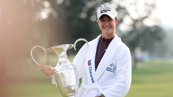 Nelly Korda poses with the Dinah Shore Trophy after victory at the Chevron Championship
