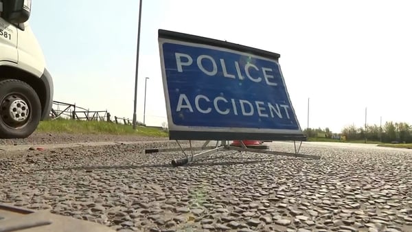 a blue sign with white writing which reads 'Police Accident'
