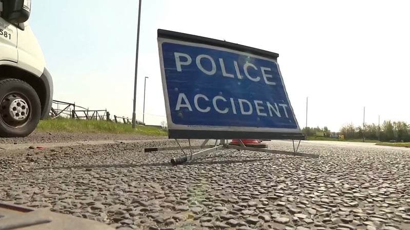 a blue sign with white writing which reads 'Police Accident'