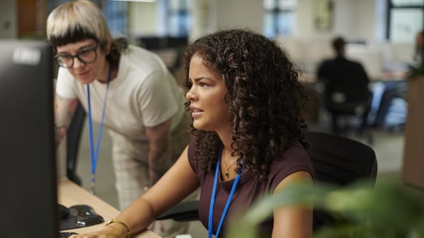 young student with study support worker