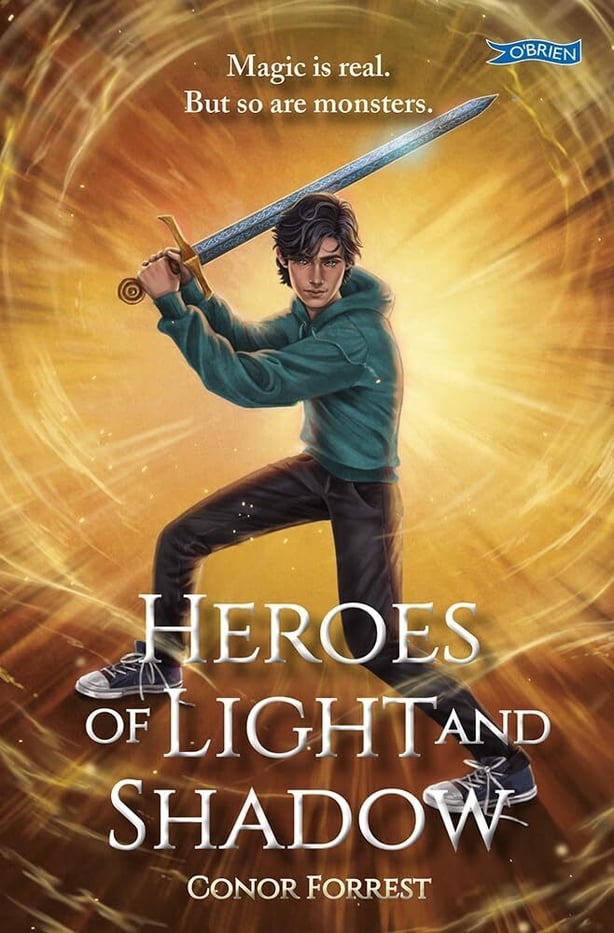 Book cover for Heroes of Light and Shadow - young boy wields a sword