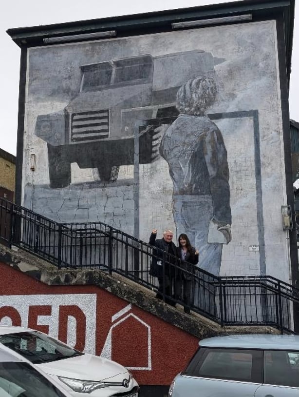 Billy McVeigh stands in front of 'The Rioter mural', Rossville Street, Derry Bogside. Photograph taken on 18 June 2025.