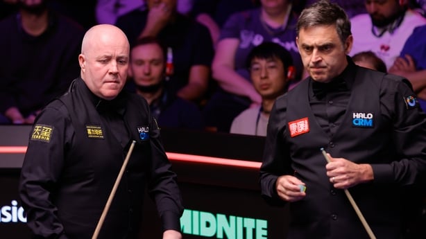 SHEFFIELD, ENGLAND - APRIL 26: Ronnie O'Sullivan (R) of England and John Higgins of Scotland react in the second round match on day 9 of Halo World Championship 2026 at Crucible Theatre on April 26, 2026 in Sheffield, England. (Photo by Tai Chengzhe/VCG via Getty Images)