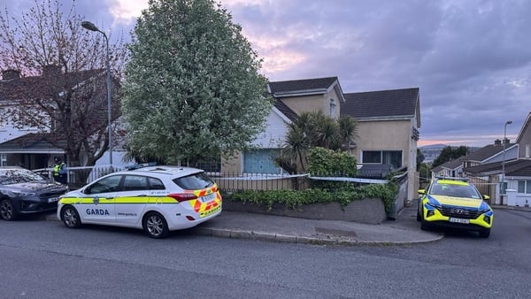 Gardaí outside a house in Waterford City