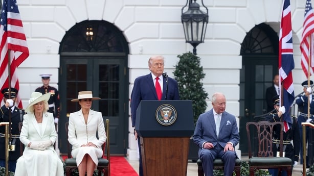 Queen Camilla sitting beside, US First Lady Melania Trump, President Donald Trump, and King Charles at the White House