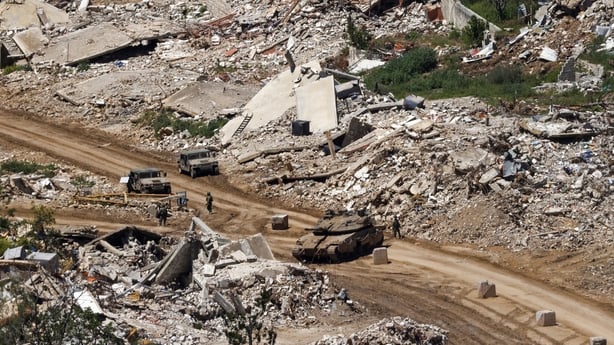 Israeli tanks and military vehicles in a town the IDF destroyed in southern Lebanon