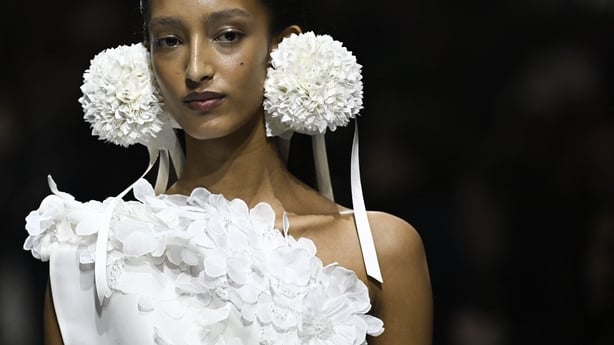 Danish model Mona Tougaard presents a creation for Christian Dior during the Women's Haute Couture Spring/Summer 2026