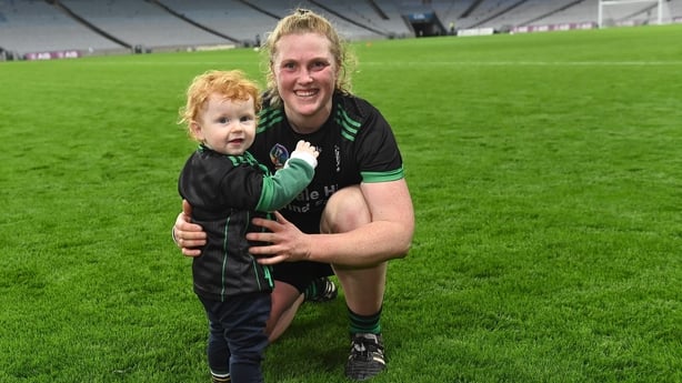 Celebrating the 2023 club All-Ireland camogie final victory with her son Ruadh at Croke Park