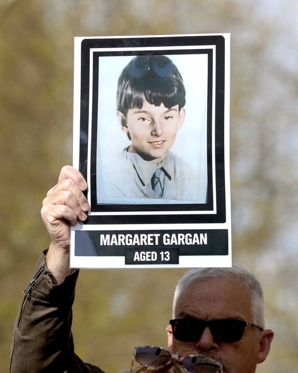 A Springhill Westrock campaigner holds an image of Margaret Gargan 