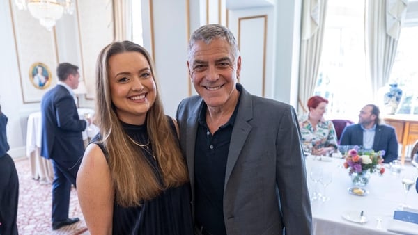 Handout photo dated 30/04/26 issued by Social Bite/Itison of Claire Phale and George Clooney at the Gleaneagles Hotel, Auchterarder. Claire presented George with personalised Scotland strips for George, Amal and their 8-year-old twins. Picture date: Thurs