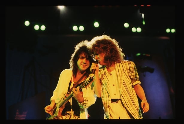 Guitarist Craig Chaquico and singer Grace Slick perform during a Starship, formerly Jefferson Starship, concert. (Photo by © Roger Ressmeyer/CORBIS/VCG via Getty Images)