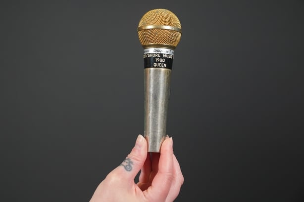 Freddie Mercury's Gold Shure 565 SD Microphone Award at the Music Memorabilia Live Auction collection at the Propstore auction house in London. Photo: Lucy North/PA Wire