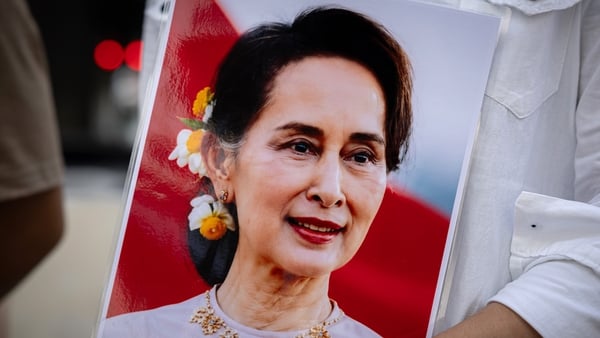 BANGKOK, THAILAND - MAY 01: Myanmar migrant group members hold a framed photo of Aung San Suu Kyi, who was recently moved from prison to house arrest, during a Labor Day rally at the Bangkok Art and Culture Center. on May 01, 2026 in Bangkok, Thailand. Th