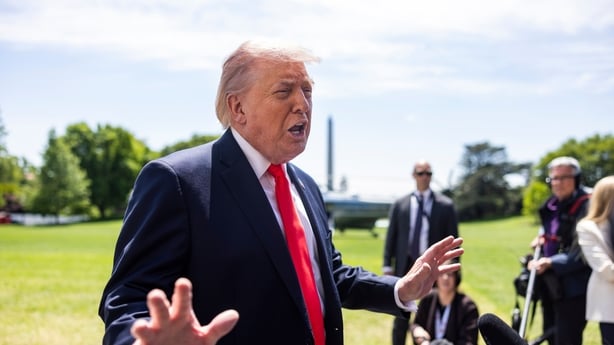 US President Donald Trump speaks to members of the media on the South Lawn of the White House before boarding Marine One in Washington, DC, US, on Friday, May 1, 2026. Trump expressed displeasure with the current state of negotiations with Iran, blaming disjointed leadership in Tehran for preventing
