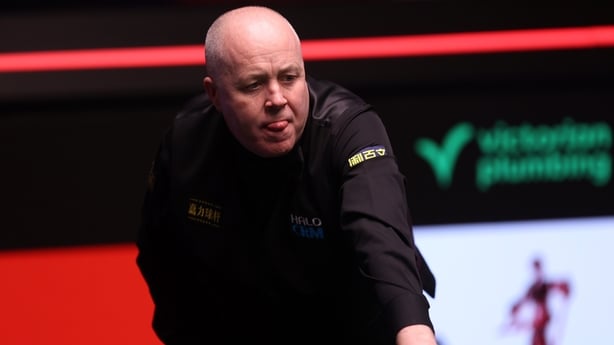 SHEFFIELD, ENGLAND - MAY 01: John Higgins of Scotland reacts during the semi final match against Shaun Murphy of England on day fourteen of the Halo World Snooker Championship at The Crucible Theatre on May 01, 2026 in Sheffield, England. (Photo by George Wood/Getty Images)