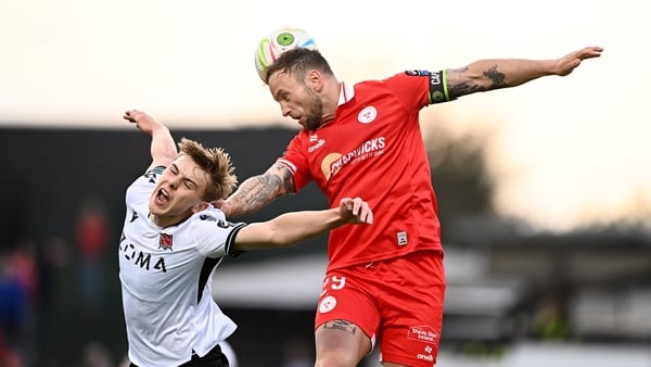 1 May 2026; Ronan Teahan of Dundalk is tackled by Paddy Barrett of Shelbourne during the SSE Airtricity Men's Premier Division match between Dundalk and Shelbourne at Oriel Park in Dundalk, Louth. Photo by Ben McShane/Sportsfile