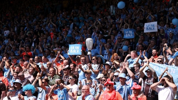 WATFORD, ENGLAND - MAY 02: Fans of Coventry City show their support in the stands during the Sky Bet Championship match between Watford and Coventry City at Vicarage Road on May 02, 2026 in Watford, England. (Photo by Richard Heathcote/Getty Images)