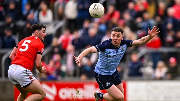 Cormac Costello of Dublin (r) in action against Emmet Carolan of Louth - 2026 Leinster SFC final