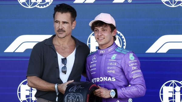 (L/R) Irish actor Colin Farrell stands with pole position winner Mercedes' Italian driver Kimi Antonelli after the qualifying session for the 2026 Miami Formula One Grand Prix at Miami International Autodrome in Miami Gardens, Florida, on May 2, 2026. (Ph