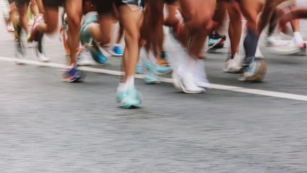 A view of people's legs as they run