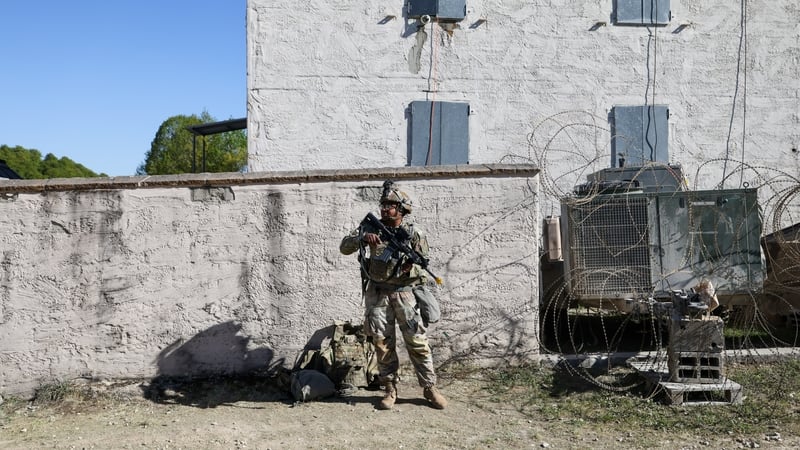 A soldier from the US Army in a simulated village during the Combined Resolve "Greywolves" exercise at the US military Grafenwoehr Training Area in Grafenwoehr, Germany, on Thursday, April 30, 2026. President Donald Trump said the US is reviewing its troo