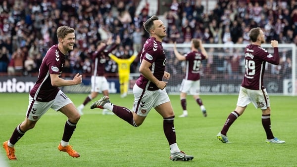 Hearts' Lawrence Shankland (centre) celebrates what proved to be the winning goal