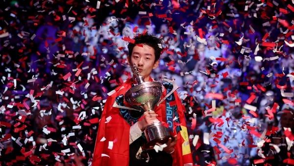 Wu Yize celebrates victory at the Crucible