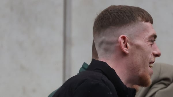 A photograph taken on March 24 2026 of Joshua Rush outside a court building