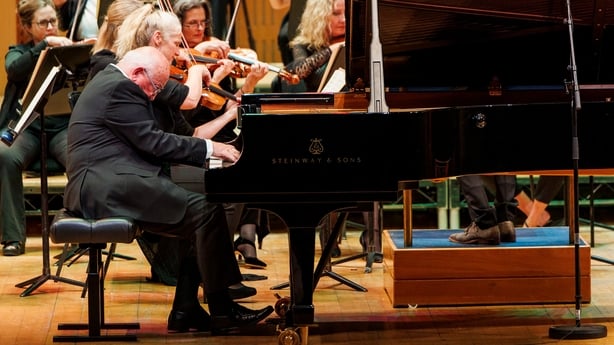 Repro Free: 19/08/2022 Pianist John O'Conor pictured performing wi the RTÉ Concert Orchestra celebratory concert to mark his 75th birthday at the National Concert Hall Dublin. Picture Andres Poveda