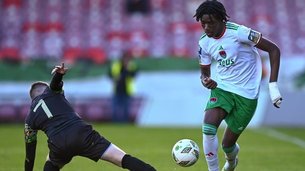 Jaden Umeh of Cork City evades the tackle of William Armshaw of Treaty United during the SSE Airtricity Men's First Division match between Cork City and Treaty United at Turner's Cross in Cork.