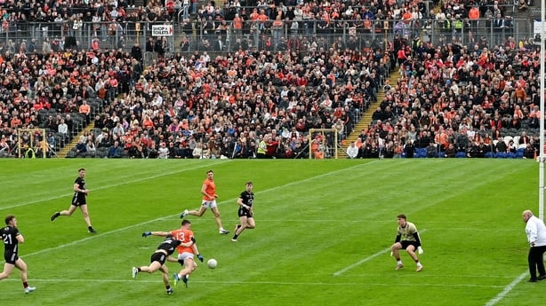 3 May 2026; Oisin Conaty of Armagh is fouled by Pearse McPolin of Down during the Ulster GAA Football Senior Championship semi-final match between Armagh and Down at St Tiernach's Park in Clones, Monaghan. Photo by Ramsey Cardy/Sportsfile