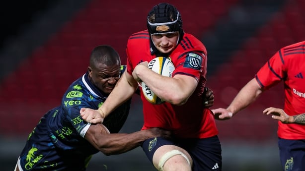 18 April 2026; Gavin Coombes of Munster is tackled by Alessandro Izekor of Benetton during the United Rugby Championship match between Benetton and Munster at Stadio Monigo in Treviso, Italy. Photo by Tim Rogers/Sportsfile