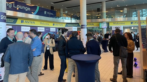 People gathered at a event for start-up companies in the Aviva stadium