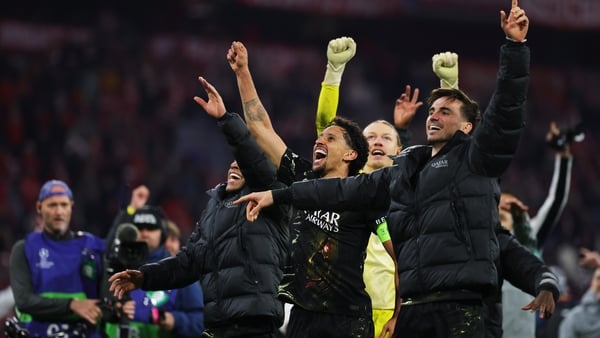 Marquinhos of Paris Saint-Germain celebrates with teammates after the team's victory in the UEFA Champions League 2025/26 Semi Final Second Leg match between FC Bayern München and Paris Saint-Germain at Football Arena Munich on May 06, 2026 in Munich, Ger