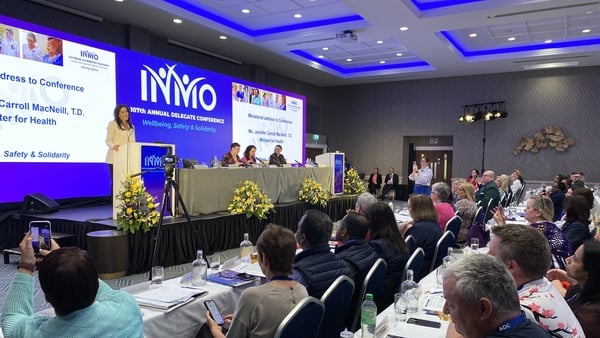 jennifer carroll macneill speaks to delegates at INMO conference
