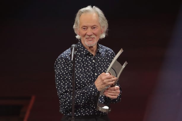 BERLIN, GERMANY - APRIL 12: (L-R) Klaus Voormann receives the 'Lifeswork' award by Wolfgang Niedecken on stage during the Echo Award show at Messe Berlin on April 12, 2018 in Berlin, Germany. (Photo by Andreas Rentz/Getty Images)